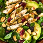 Cranberry Avocado Spinach Salad with Chicken and Orange Poppy Seed Dressing